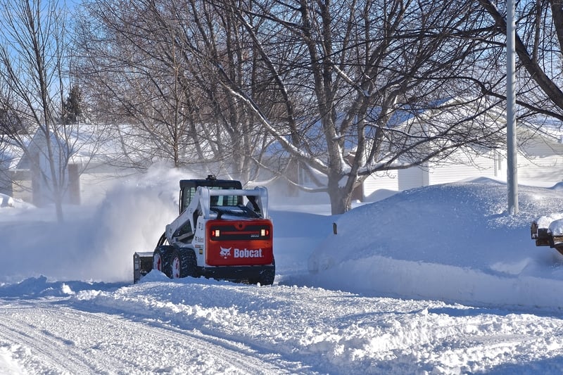 skid steer blowing snow 