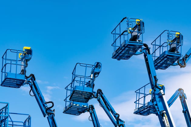 telehandlers on a rental lot